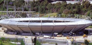 ARCHITECTURAL GALVANIZING In the galvanizing process steel components are dipped into a bath of molten zinc, creating an alloy of approximately 40% iron/58.5 % zinc/1.5% lead on the surface Sydney Tennis Centre, all visible structural steel, lighting columns and power transmission              steelwork is hot dip galvanized