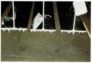 Description: Spikes and teardrops of zinc along bottom edges of item.Cause: Affected surface horizontal to zinc bath on withdrawal, preventing point drainage of zinc from the surface. Difficult to eliminate from 3-D fabrications. Remedy: Drainage spikes can be minimised by fettling the work as it emerges from the zinc bath if edges are accessible. Spikes are removed during inspection stage by buffing as a standard dressing procedure.
