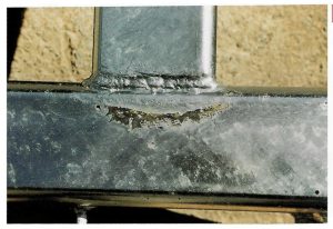 Description: Uncoated area on galvanized surfaceCause: Inadequate surface preparation, usually in pickling process, and sometimes caused by local areas of heavy rust. Contamination of surface with paint or items touching during processing to prevent adequate access by pre-treatment solution or molten zinc. Remedy: Ensure that surfaces are clean and clear prior to pre-treatment. Small missed areas can be repaired with appropriate zinc rich paint in accordance with International standards