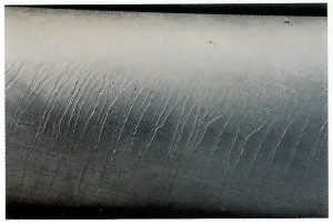Description: Irregular pattern formed on surface of large diameter pipe over entire surface.Cause: Variations in surface chemistry on pipe feed cause minor variations in reaction rate of steel with the zinc across the surface, causing galvanized coating to vary in thickness in sharply defined zone across the surface. Remedy: Change steel grade. This defect rarely occurs with other than imported pipe. Only effects appearance – no effect on durability.